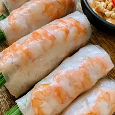 Plate of fresh Vietnamese spring rolls with dipping sauce