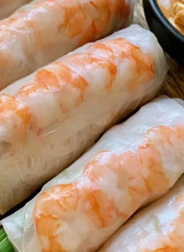 Plate of fresh Vietnamese spring rolls with dipping sauce