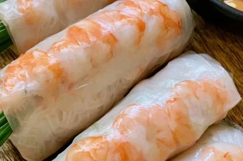 Plate of fresh Vietnamese spring rolls with dipping sauce