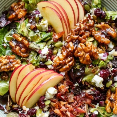 Cozy apple walnut salad with fresh apples, walnuts, and greens served in a bowl