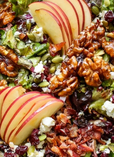 Cozy apple walnut salad with fresh apples, walnuts, and greens served in a bowl
