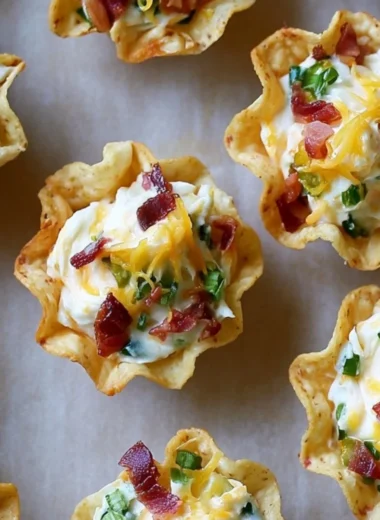 Cozy baked jalapeño popper bites topped with cheese and spices