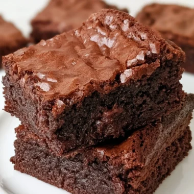 Delicious homemade brownies on a plate, made from a cozy classic brownie recipe.