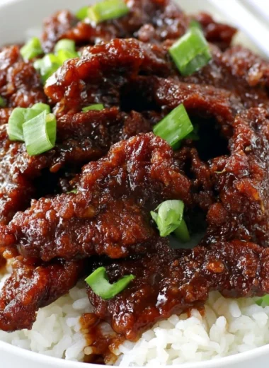 Delicious Gluten Free 30-Minute Mongolian Beef served with garnishes