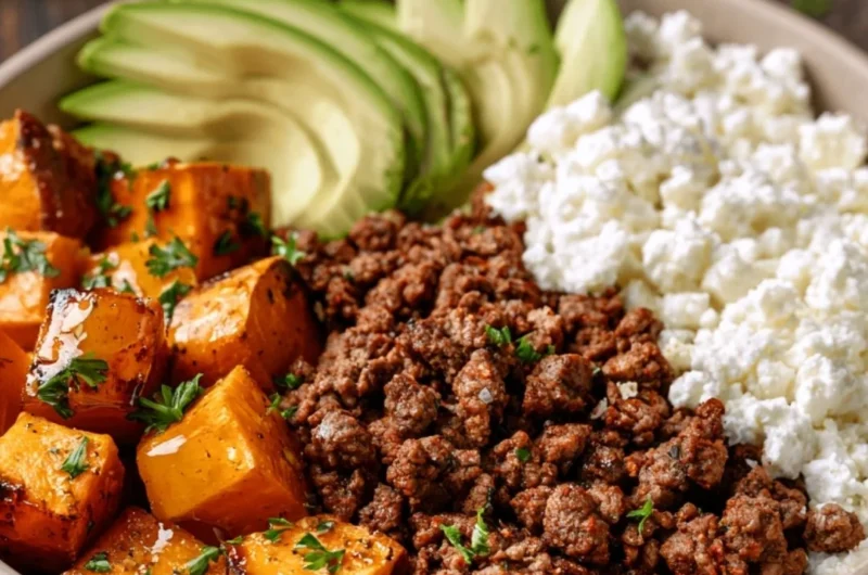 Hot honey sweet potato beef bowls garnished with fresh herbs.